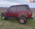 Красный ВАЗ 21214, объемом двигателя 1.7 л и пробегом 160 тыс. км за 3500 $, фото 5 на Automoto.ua