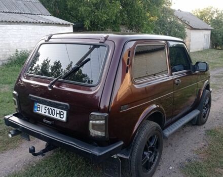 Красный ВАЗ 21214, объемом двигателя 1.7 л и пробегом 65 тыс. км за 5000 $, фото 1 на Automoto.ua