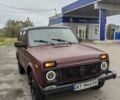 Красный ВАЗ 21214, объемом двигателя 1.7 л и пробегом 125 тыс. км за 2999 $, фото 1 на Automoto.ua