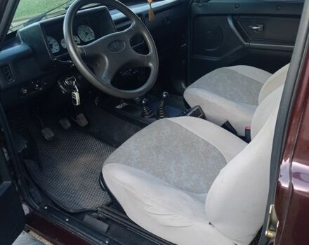 Красный ВАЗ 21214, объемом двигателя 1.7 л и пробегом 65 тыс. км за 5000 $, фото 10 на Automoto.ua