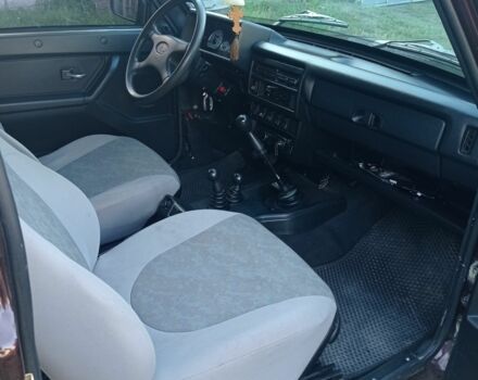 Красный ВАЗ 21214, объемом двигателя 1.7 л и пробегом 65 тыс. км за 5000 $, фото 11 на Automoto.ua