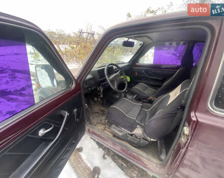 Красный ВАЗ 21214, объемом двигателя 1.7 л и пробегом 133 тыс. км за 4000 $, фото 6 на Automoto.ua
