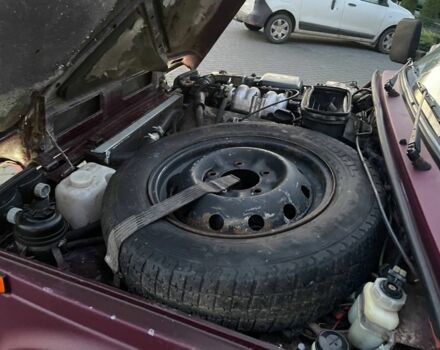 Красный ВАЗ 21214, объемом двигателя 1.7 л и пробегом 219 тыс. км за 2900 $, фото 5 на Automoto.ua