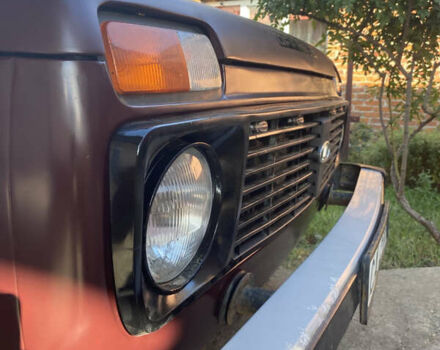 Красный ВАЗ 21214, объемом двигателя 1.7 л и пробегом 184 тыс. км за 3800 $, фото 1 на Automoto.ua