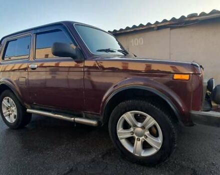 Красный ВАЗ 21214, объемом двигателя 1.69 л и пробегом 105 тыс. км за 3500 $, фото 3 на Automoto.ua