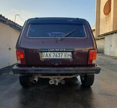 Красный ВАЗ 21214, объемом двигателя 1.69 л и пробегом 105 тыс. км за 3500 $, фото 4 на Automoto.ua