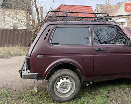 Красный ВАЗ 21214, объемом двигателя 1.69 л и пробегом 80 тыс. км за 3500 $, фото 5 на Automoto.ua