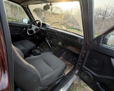 Красный ВАЗ 21214, объемом двигателя 1.7 л и пробегом 123 тыс. км за 5200 $, фото 5 на Automoto.ua