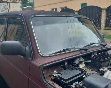 Красный ВАЗ 21214, объемом двигателя 1.69 л и пробегом 230 тыс. км за 3500 $, фото 3 на Automoto.ua