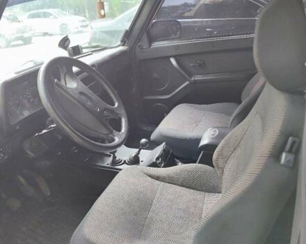 Красный ВАЗ 21214, объемом двигателя 1.7 л и пробегом 93 тыс. км за 4950 $, фото 9 на Automoto.ua