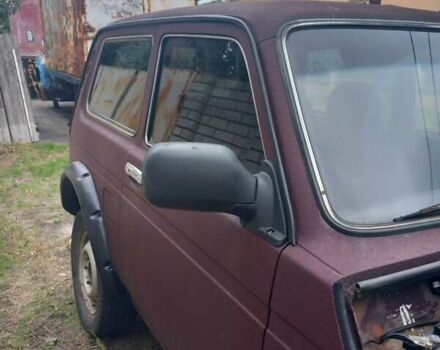 Красный ВАЗ 21214, объемом двигателя 1.69 л и пробегом 230 тыс. км за 3500 $, фото 1 на Automoto.ua