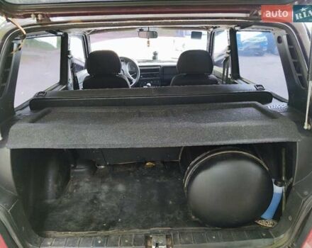 Красный ВАЗ 21214, объемом двигателя 1.7 л и пробегом 93 тыс. км за 4950 $, фото 5 на Automoto.ua