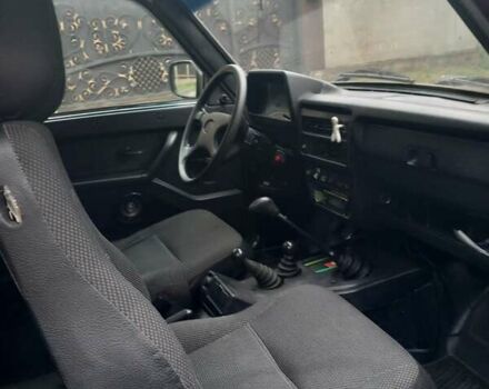 Красный ВАЗ 21214, объемом двигателя 1.69 л и пробегом 230 тыс. км за 3500 $, фото 8 на Automoto.ua