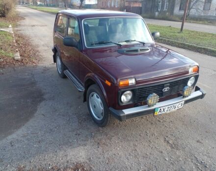 Красный ВАЗ 21214, объемом двигателя 1.7 л и пробегом 65 тыс. км за 5500 $, фото 1 на Automoto.ua