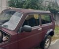 Червоний ВАЗ 21214, об'ємом двигуна 1.69 л та пробігом 230 тис. км за 4000 $, фото 1 на Automoto.ua