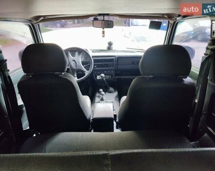 Красный ВАЗ 21214, объемом двигателя 1.7 л и пробегом 93 тыс. км за 4950 $, фото 6 на Automoto.ua