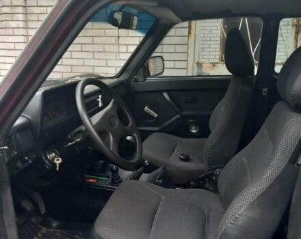 Красный ВАЗ 21214, объемом двигателя 1.69 л и пробегом 230 тыс. км за 3500 $, фото 5 на Automoto.ua