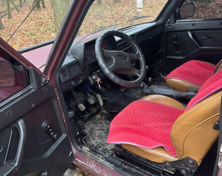 Красный ВАЗ 21214, объемом двигателя 1.7 л и пробегом 100 тыс. км за 4400 $, фото 8 на Automoto.ua