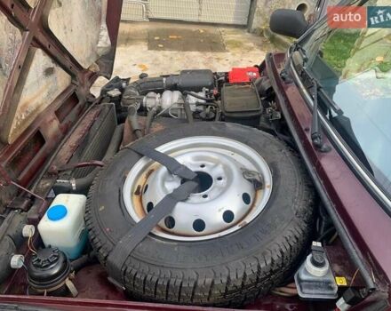 Красный ВАЗ 21214, объемом двигателя 1.69 л и пробегом 142 тыс. км за 5200 $, фото 20 на Automoto.ua