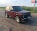 Красный ВАЗ 21214, объемом двигателя 1.7 л и пробегом 297 тыс. км за 3800 $, фото 1 на Automoto.ua