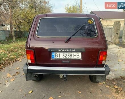 Красный ВАЗ 21214, объемом двигателя 1.69 л и пробегом 142 тыс. км за 5200 $, фото 8 на Automoto.ua