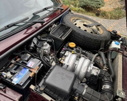 Красный ВАЗ 21214, объемом двигателя 1.7 л и пробегом 160 тыс. км за 5500 $, фото 2 на Automoto.ua