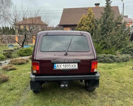 Красный ВАЗ 21214, объемом двигателя 1.7 л и пробегом 160 тыс. км за 5500 $, фото 4 на Automoto.ua