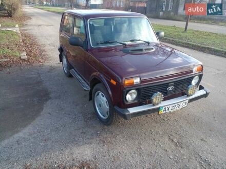 Красный ВАЗ 21214, объемом двигателя 1.7 л и пробегом 65 тыс. км за 5500 $, фото 1 на Automoto.ua