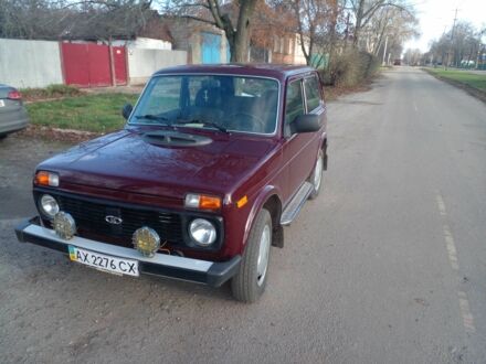 Красный ВАЗ 21214, объемом двигателя 1.7 л и пробегом 65 тыс. км за 5500 $, фото 1 на Automoto.ua