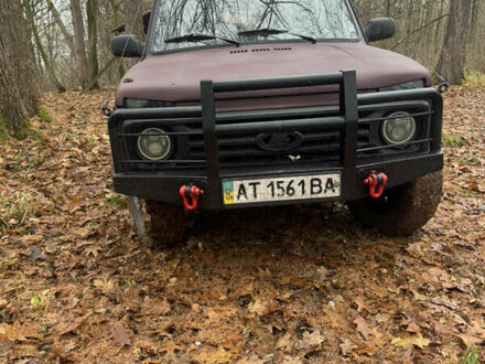 Красный ВАЗ 21214, объемом двигателя 1.7 л и пробегом 100 тыс. км за 4400 $, фото 1 на Automoto.ua