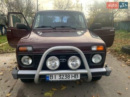 Красный ВАЗ 21214, объемом двигателя 1.69 л и пробегом 142 тыс. км за 5200 $, фото 1 на Automoto.ua