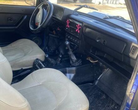 Синий ВАЗ 21214, объемом двигателя 1.7 л и пробегом 217 тыс. км за 3900 $, фото 11 на Automoto.ua