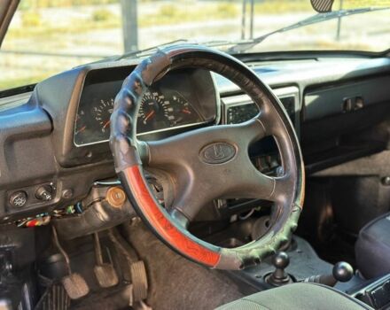 Зеленый ВАЗ 21214, объемом двигателя 1.7 л и пробегом 431 тыс. км за 4299 $, фото 7 на Automoto.ua