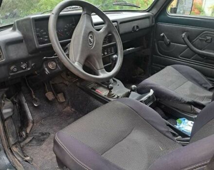 Зеленый ВАЗ 21214, объемом двигателя 1.7 л и пробегом 300 тыс. км за 2600 $, фото 6 на Automoto.ua