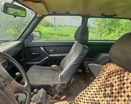 Зелений ВАЗ 21214, об'ємом двигуна 1.7 л та пробігом 300 тис. км за 1787 $, фото 8 на Automoto.ua