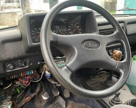 Зелений ВАЗ 21214, об'ємом двигуна 1.7 л та пробігом 300 тис. км за 2607 $, фото 7 на Automoto.ua