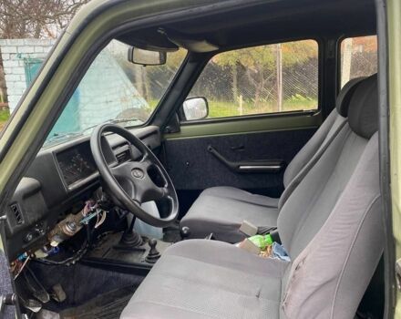 Зелений ВАЗ 21214, об'ємом двигуна 1.7 л та пробігом 300 тис. км за 2607 $, фото 5 на Automoto.ua