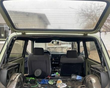 Зелений ВАЗ 21214, об'ємом двигуна 1.7 л та пробігом 300 тис. км за 2607 $, фото 6 на Automoto.ua