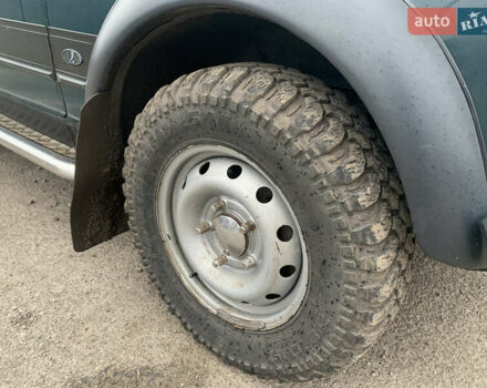 Зеленый ВАЗ 21214, объемом двигателя 1.7 л и пробегом 175 тыс. км за 3300 $, фото 2 на Automoto.ua