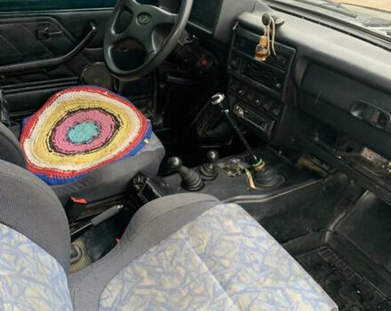 Зеленый ВАЗ 21214, объемом двигателя 1.7 л и пробегом 175 тыс. км за 3300 $, фото 8 на Automoto.ua