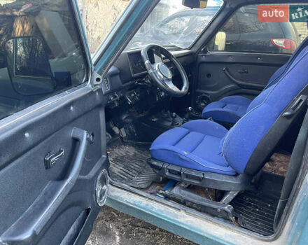 Зеленый ВАЗ 21214, объемом двигателя 1.7 л и пробегом 235 тыс. км за 3200 $, фото 5 на Automoto.ua