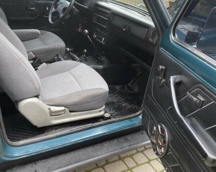 Зелений ВАЗ 21214, об'ємом двигуна 1.7 л та пробігом 127 тис. км за 3850 $, фото 10 на Automoto.ua