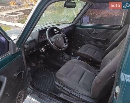 Зелений ВАЗ 21214, об'ємом двигуна 1.69 л та пробігом 186 тис. км за 3000 $, фото 4 на Automoto.ua