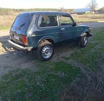 Зеленый ВАЗ 21214, объемом двигателя 1.69 л и пробегом 183 тыс. км за 3300 $, фото 2 на Automoto.ua