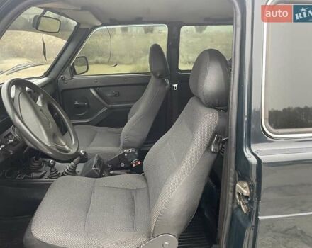 Зеленый ВАЗ 21214, объемом двигателя 1.69 л и пробегом 81 тыс. км за 6100 $, фото 3 на Automoto.ua