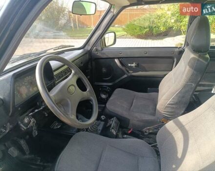 Зелений ВАЗ 21214, об'ємом двигуна 1.69 л та пробігом 260 тис. км за 2950 $, фото 14 на Automoto.ua