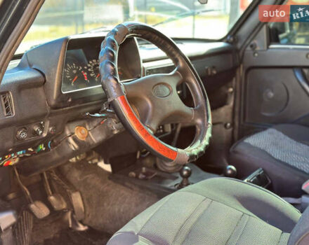 Зеленый ВАЗ 21214, объемом двигателя 1.69 л и пробегом 431 тыс. км за 4299 $, фото 9 на Automoto.ua