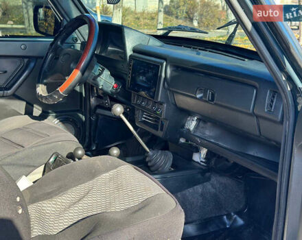 Зеленый ВАЗ 21214, объемом двигателя 1.69 л и пробегом 431 тыс. км за 4299 $, фото 10 на Automoto.ua