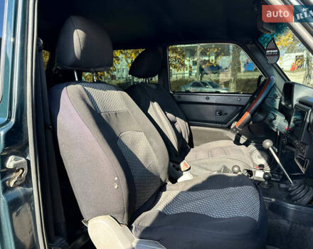 Зеленый ВАЗ 21214, объемом двигателя 1.69 л и пробегом 431 тыс. км за 4299 $, фото 13 на Automoto.ua