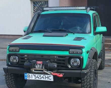 Зеленый ВАЗ 21214, объемом двигателя 1.69 л и пробегом 100 тыс. км за 9000 $, фото 1 на Automoto.ua